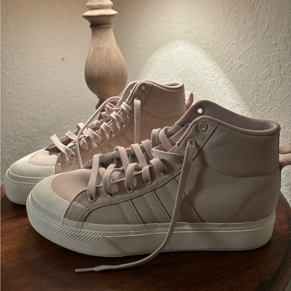 Adidas lace up platform sneakers. Perfect for cold.Never worn. All sales final.